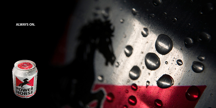 The word ‘Refuel’ in the condensation droplets was created in-camera using advanced studio know-how. No Photoshop was used to achieve this effect